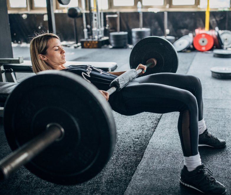 Woman Lifting on The Gym